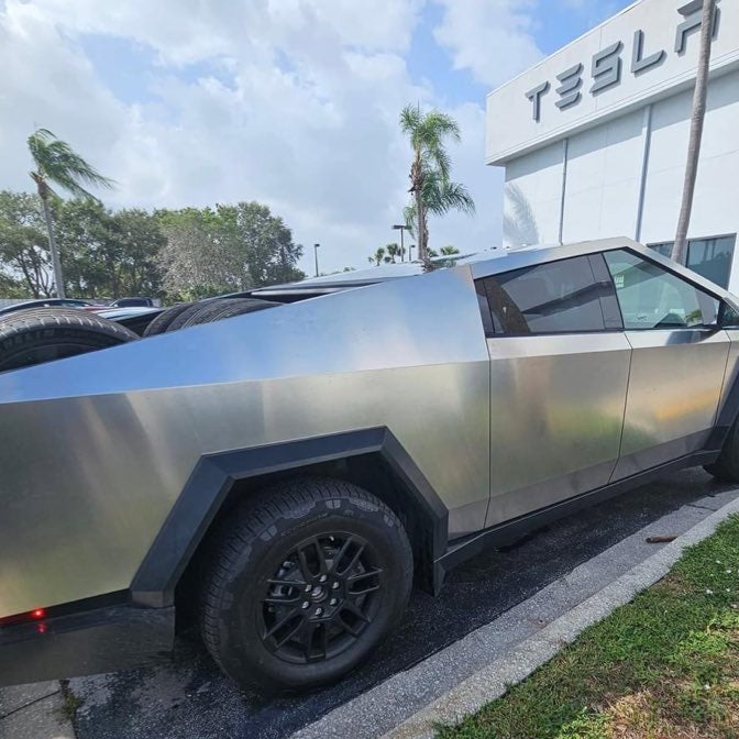 Tesla Cybertruck Spotted With An Impressive 8 Tires On Its Bed